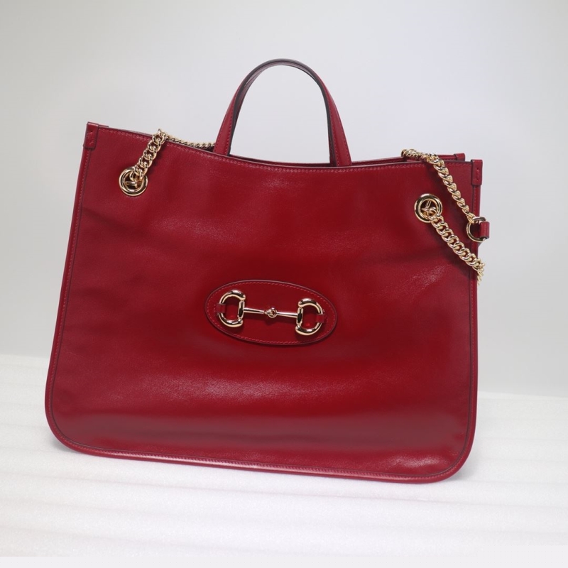 G*u*i shopping bags